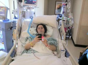 Christine in the ICU After Brain Surgery Using her IPhone